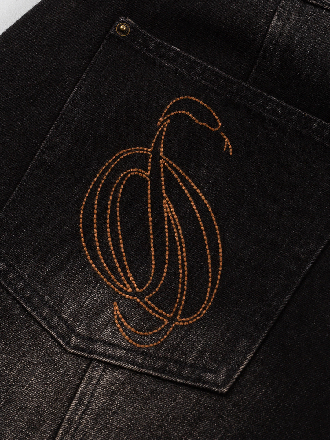 Cursive Washed Denim Jeans