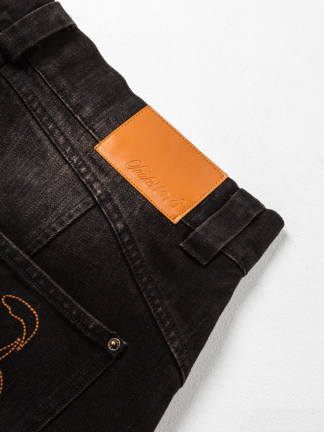 Cursive Washed Denim Jeans