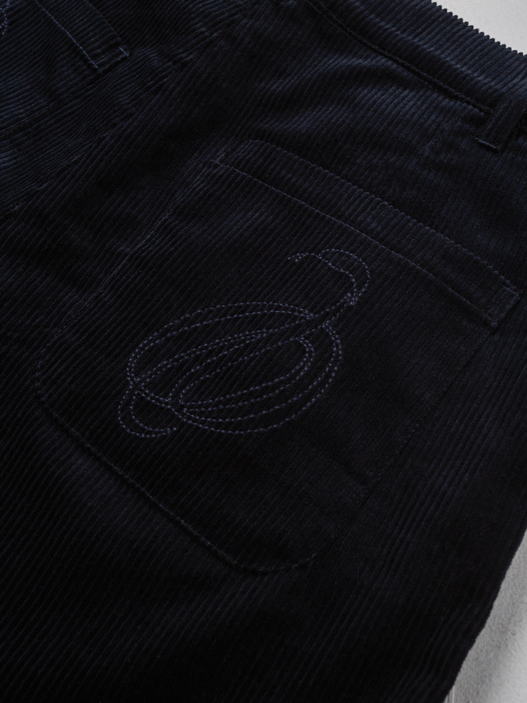 Gridline Pleated Corduroy Trousers
