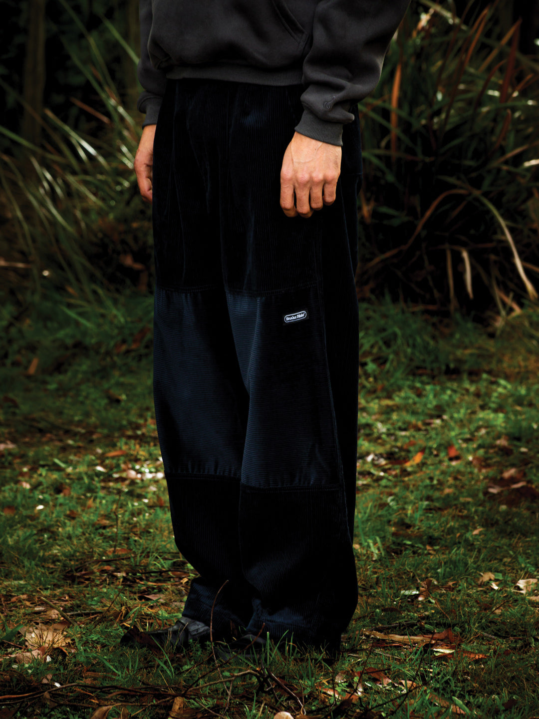 Gridline Pleated Corduroy Trousers