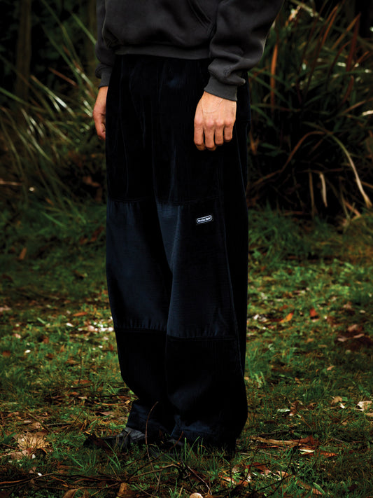 Gridline Pleated Corduroy Trousers