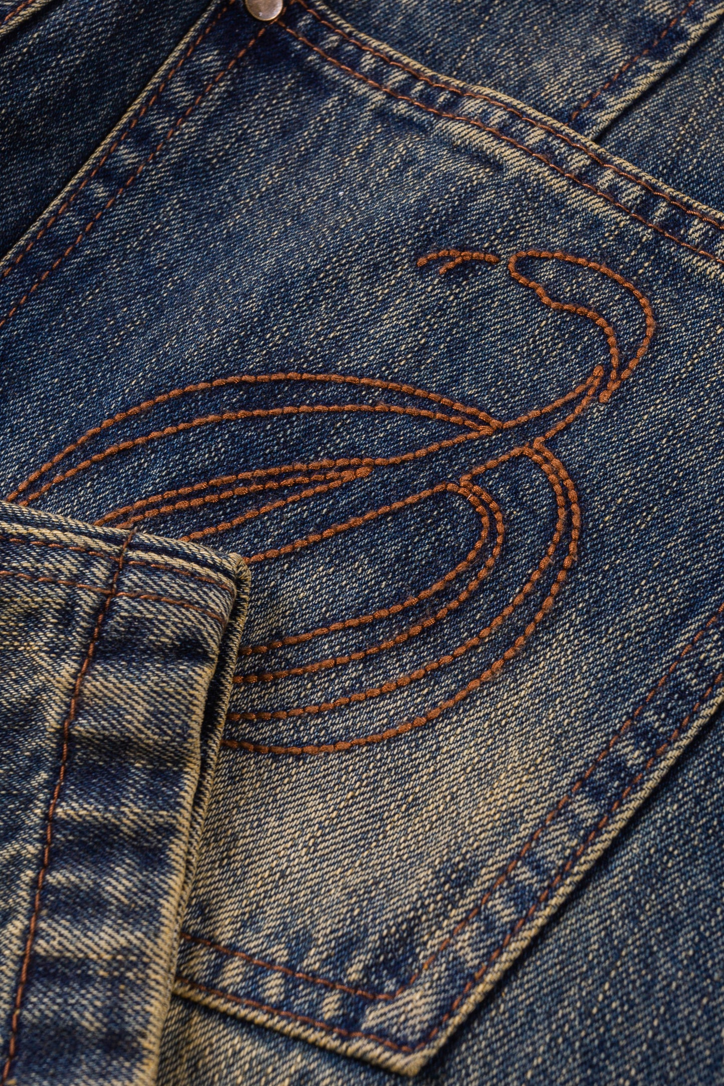 Cursive Washed Denim Jeans